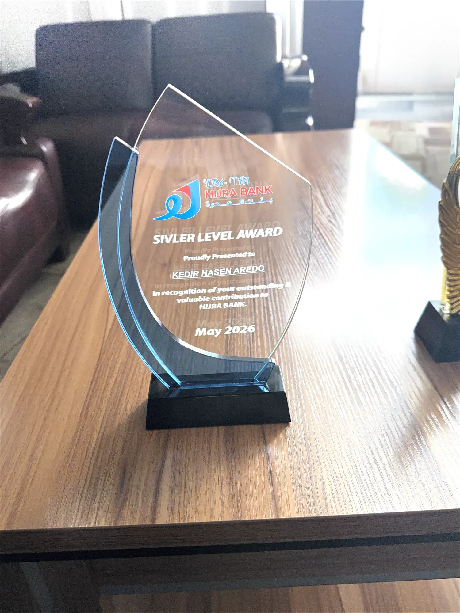 Hijra Bank Silver Level Award presented to Kedir Hasen Aredo in May 2026