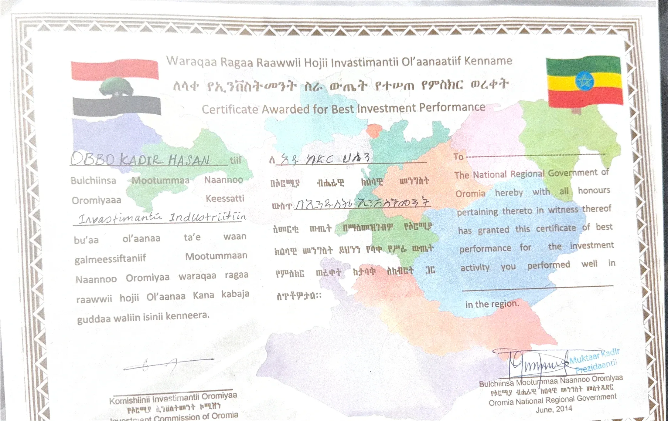2014 Oromia certificate for Best Investment Performance presented to Kadir Hasan