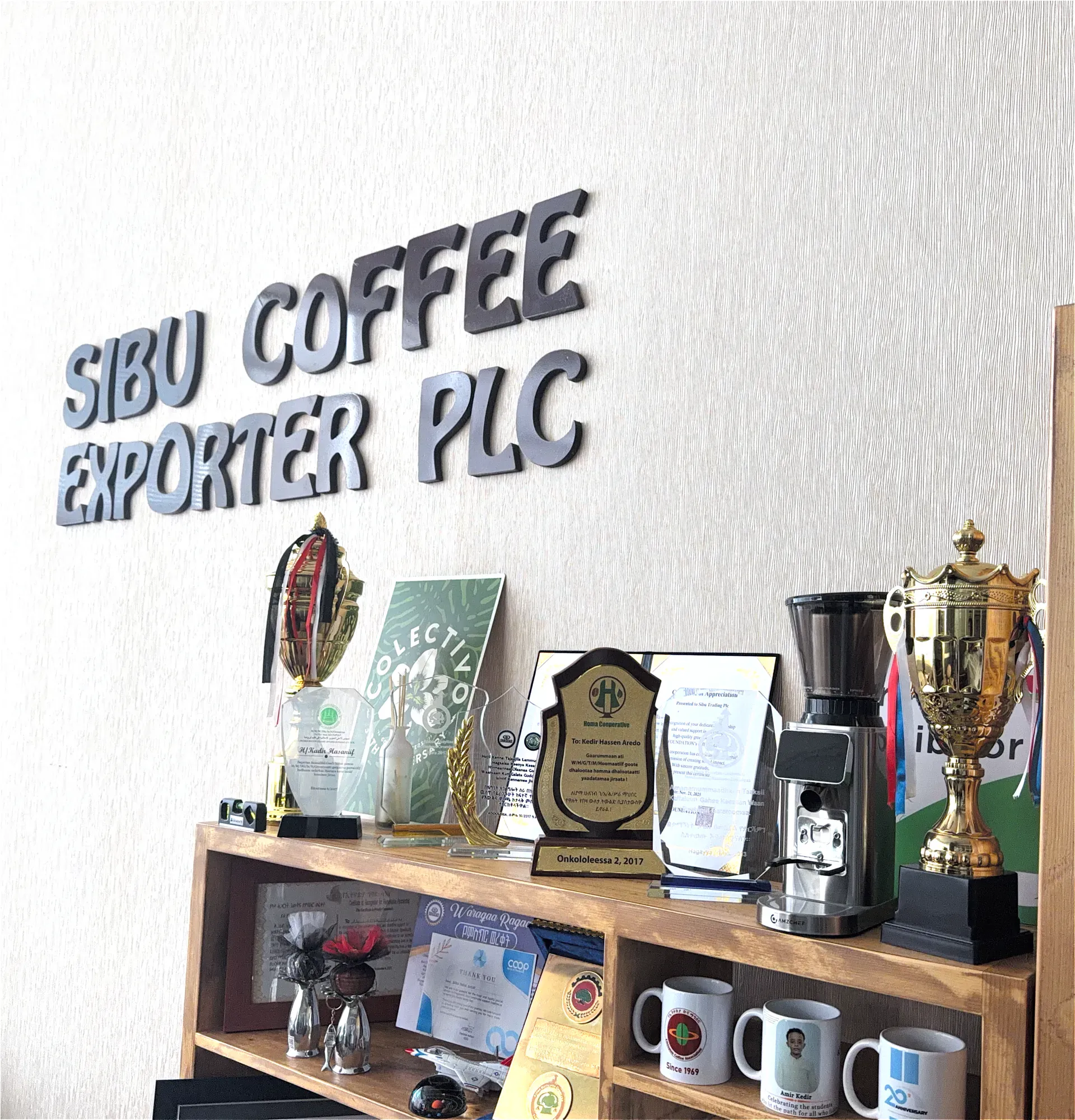 Sibu Coffee Exporter PLC recognition display with certificates, plaques and trophies